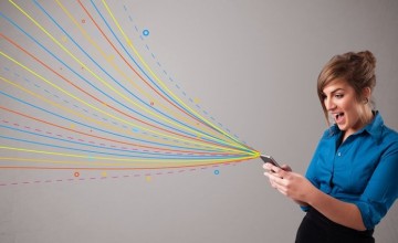 Happy girl holding a phone with colorful abstract lines